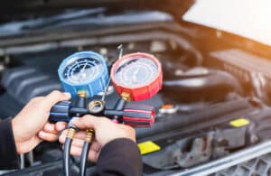 How much does it cost to Regas a car air conditioner in Australia?